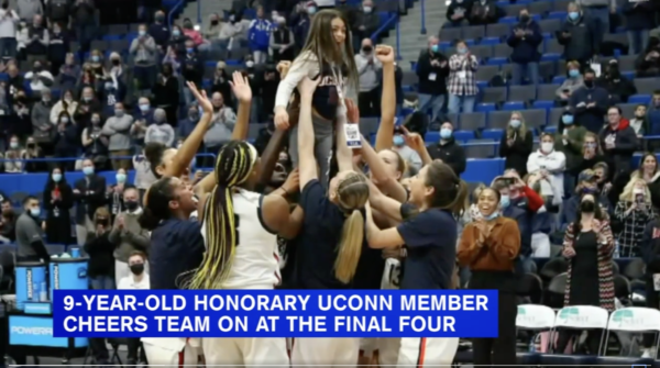Uconn Women's basketball team hoists Daniela in the air in celebration